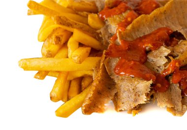 Donner Kebap Closeup, Doner Meat and Chips, Donner, Shawarma or Gyro with Sauce and Red Pepper clipart