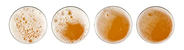 ビールの隔離されたトップビュー ガラスでろ過されていないラガー 泡が付いている小麦のビール アルコール飲料のマグの上の泡 フロス 白い背景の金ビール — ストック写真