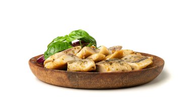 Salted Herring Fillet Isolated, Raw Pickled Fish Meat with Herbs and Spices, Marinated Herring on Wood Plate, White Background