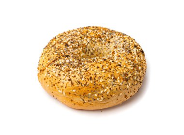 İzole edilmiş Bagel, Bir Yuvarlak Çörek, Tahıllı Buğday Fırını ve Kahvaltı için Tohumlar, Beyaz Arkaplanda Düz Çember Simit Ekmeği