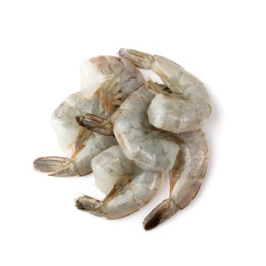 Fresh shrimp tails isolated. Raw headless prawn pile, pacific shrimp, uncooked tiger prawns, jumbo seafood on white background top view clipart