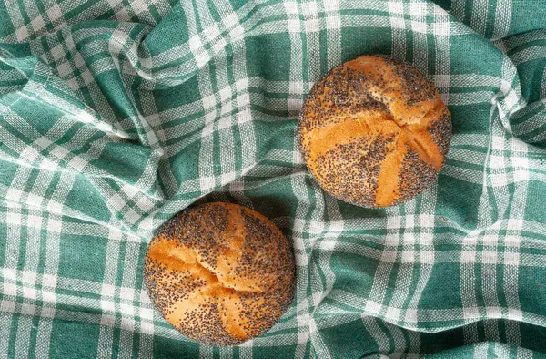 Poppy Seed Bread Isolated, Kaiser Roll, Seeds Breakfast Bun, Poppyseed Round Bagel, Poppy Seed Bun on Checkered Tablecloth Background Top View