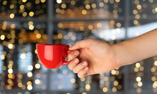 Christmas Cup in Hands, Coffee Mockup, Winter Mug Background, Empty Blank Cup, Holiday Drink Mock Up on Christmas Background