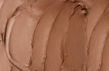 Erimiş çikolata desenli arka plan, çikolatalı sos deseni, kakao fındıklı krema, desenli çikolatalı maket, sıvı koyu macun, metin için kopyalama alanı olan kahverengi kremalı pankart.