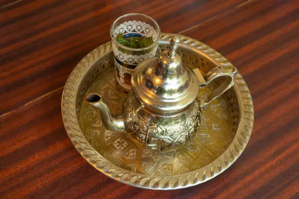 Moroccan Mint Tea in Teapot and Glass, Traditional Arabic Drink from Morocco