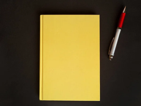 Copybook Mockup, Yellow Notebook on Office Desk with Copy Space for Text, Moleskin Template, Empty Organizer, New Diary, Notepad on Black Background Top View