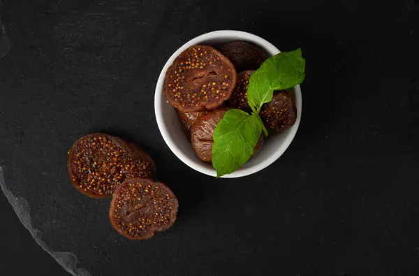 Dry Fig, Dried Ficus Carica Fruit, Sweet Healthy Diet, Tropical Dessert, Wrinkled Dehydrated Snack, Dry Figs on Black Background