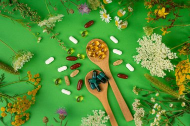 Bitkisel İlaçlar, Doğa İlaçları, Bitki Kapsülleri, Vitamin Mineral İlaçları, Sağlıklı Multivitamin İlaçları, Naturopati Hapları, İlaç ve Çiçeklerle çevrili Beslenme İlaçları