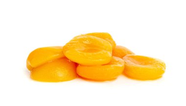 Canned Peaches Pile Isolated, Apricot Halves in Syrup, Yellow Fruit Dessert, Tinned Nectarine Compote, Orange Peeled Peache Slices on White Background clipart