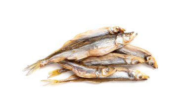 Dry smelt isolated, salted small herring, dried sardina, salted smelts, beer snacks, dehydrated anchovy, dried whole fishes jerky, stockfish delicatessen on white background clipart