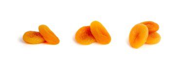 Kuru kayısı, kurutulmuş kayısı, sağlıklı portakal meyveleri grubu, tatlı organik tatlı çerez, sağlıklı diyet gıdalar, beyaz arka planda kuru kayısılar.