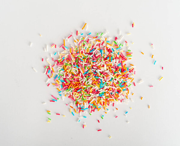 Candy Sprinkle Pile, Donut Rainbow Sprinkles Isolated, Sweet Color, Many Small Vermicelli on White Background Top View