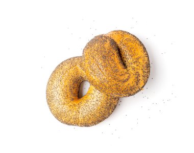 Haşhaşlı bagel izole edildi, bir yuvarlak ekmek, kahvaltıda haşhaşlı buğday ekmeği fırını, beyaz arka planda sade yuvarlak simit ekmeği