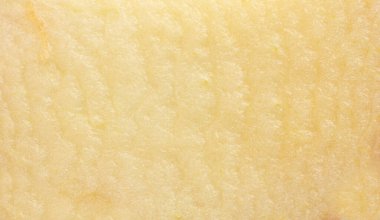 Elma kesimi makro doku. Taze sulu elma dilimi. Yakından bak. Detaylı Appl parçası.