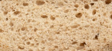 Ekmek dilimi makro doku, fırında hamur deseni. Beyaz ekmek somunu yakın kes, buğdaylı tost dilimi arka plan, sünger fırın afişi yakın plan ve fotokopi alanı ile üst manzara