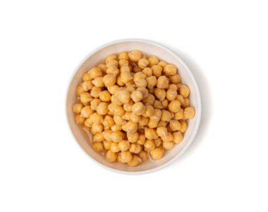 Kavanozda sırılsıklam nohutlar, suda civciv bezelyesi, şişmiş ıslak Cicer arietinum meyveleri, ham Bengal gram baklası hazırlık, garbanzo fasulyesi deseni, Mısır bezelye tohumu üst görünüm.