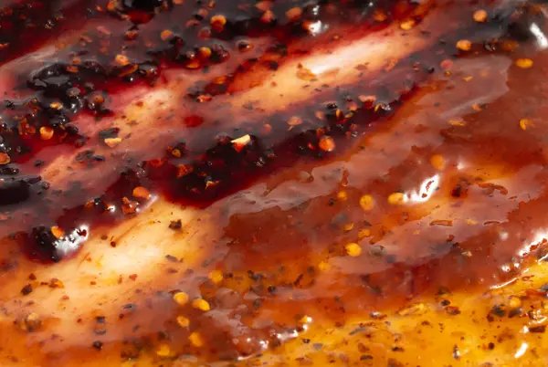 Kırmızı biberli reçel, kırmızı biberli reçel, reçelli reçel, baharatlı meyve jölesi meyveli konfeksiyon lekesi, sarı lekeli desen, reçel desenli arka plan.