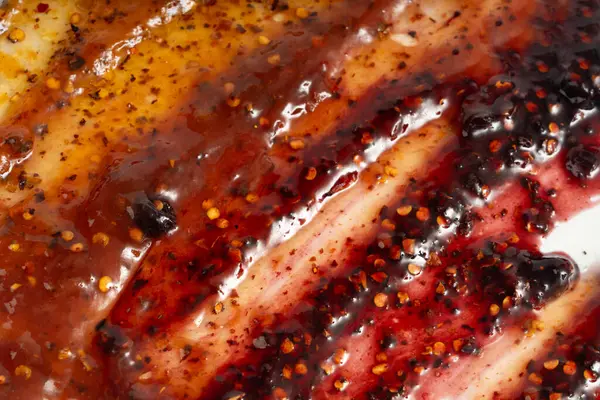 Kırmızı biberli reçel, kırmızı biberli reçel, reçelli reçel, baharatlı meyve jölesi meyveli konfeksiyon lekesi, sarı lekeli desen, reçel desenli arka plan.