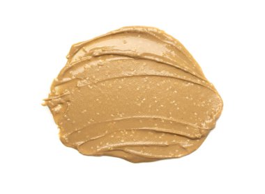 Tahini smear yalıtılmış, susam ezmesi sıçramış tahina sosu dökülmüş, doğu sosu dökülmüş, geleneksel doğu mutfağı malzemeleri dökülmüş, zemin susamı beyaz arka planda.