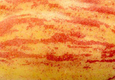 Kırmızı elma derisi makro doku. Honeycrisp meyve yüzeyi yakın, taze benekli ve çizgili elma deseni fotokopi alanı, lezzetli olgun meyve duvar kağıdı