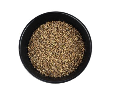 Siyah kasedeki kenevir tohumları izole, kenevir taneleri, marihuana çekirdekleri, beyaz arka plan görünümlü kenevir tohumları