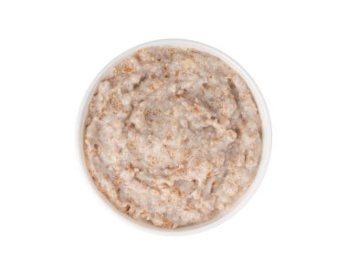 İzole edilmiş bir kasede pişirilmiş. Yulaf ezmesi sütlü yulaf lapası, haşlanmış emmer veya hecelenmiş, sağlıklı mısır gevreği. Beyaz arkaplan görünümünde buğday taneleri