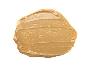 Tahini smear yalıtılmış, susam ezmesi sıçramış tahina sosu dökülmüş, doğu sosu dökülmüş, geleneksel doğu mutfağı malzemeleri dökülmüş, zemin susamı beyaz arka planda.
