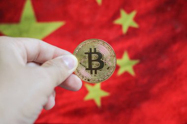 Bitcoin BTC temsil parası ve arka planda Çin bayrağı.