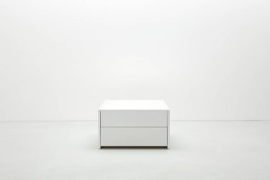 empty white box on a white floor