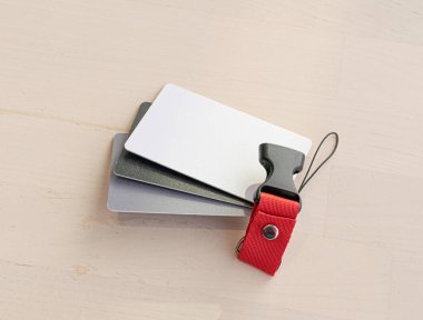 White balance cards on table, grey and black plastic cards, photographer tools for color correction