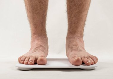 Bare Feet on Weight Scale, Bathroom Scale, Overweight Control, Obese Problem, Lost Weight Concept