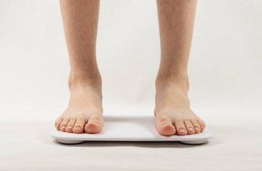 Bare Feet on Weight Scale, Bathroom Scale, Overweight Control, Obese Problem, Lost Weight Concept