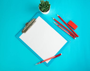 Blank Paper Tablet Top View, Empty White Sheet on Blue Table Flat Lay Mockup, Paper Tablet Texture Background with Copy Space