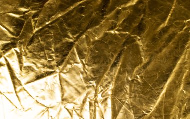 Crumpled Gold Fabric Texture Background, Wrinkled Bronze Pattern, Luxury Yellow Metallic Paper Mockup with Copy Space