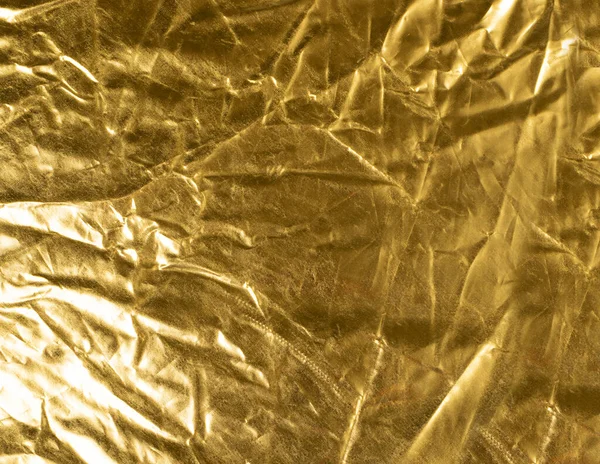 Crumpled Gold Fabric Texture Background, Wrinkled Bronze Pattern, Luxury Yellow Metallic Paper Mockup with Copy Space