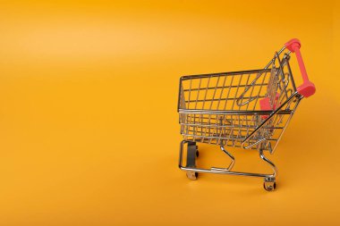 Shopping Basket on Yellow Background, Shopping Cart, Shop Cart Mockup, Empty Trolley, Supermarket Cart with Copy Space