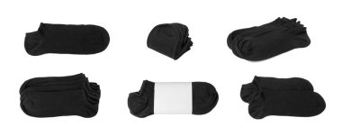 New Black Cotton Sock Isolated. Folded Sportswear, Classic Unisex Cotton Socks, Casual Hosiery on White Background Top View