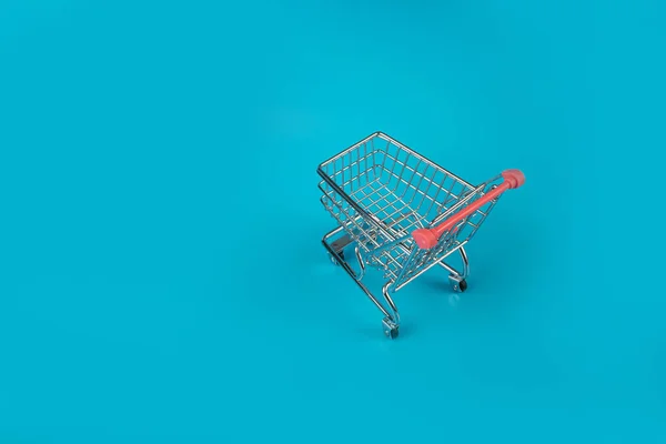 Shopping Basket on Blue Background, Shopping Cart, Shop Cart Mockup, Empty Trolley, Supermarket Cart with Copy Space