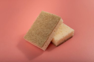 Natural Sponge, Eco Brown Sponges, Eco Friendly Hygiene Accessory, Scotch Brite Dishwasher on Pink Background