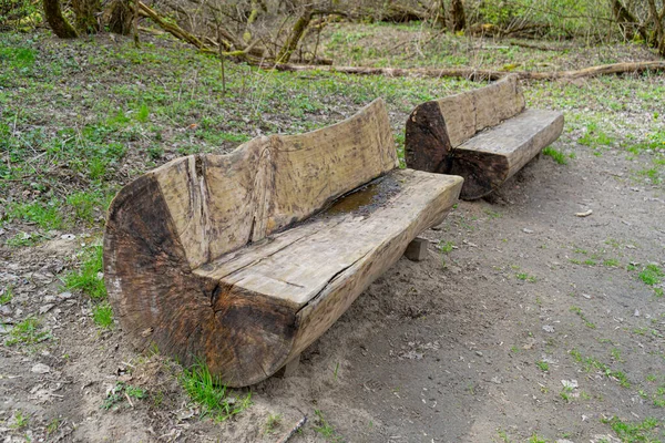 Old Shabby Wooden Bench in Park Made of a Single Tree Trunk, Outdoor Architecture, Wood Benches, Outdoor Chair, Public Furniture, Rustic Bench in Recreation Area