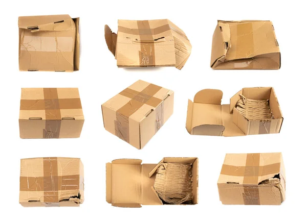 Beschädigtes Schachtelset Isoliert Bastelpapier Lieferpaket Gebrochene Kartonverpackung Zerknüllte Kartonschachtel Auf — Stockfoto