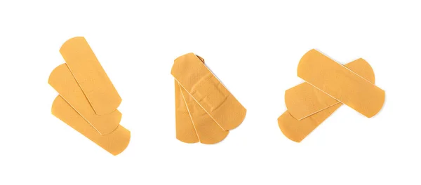 包帯プラスターセット分離 医療パッチセット バンドエイドコレクション 新しいベージュスティックプラスター 白い背景にバンドエイドパッチ — ストック写真