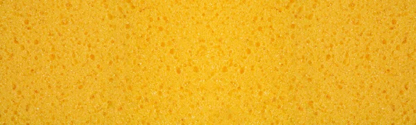 海绵筛侧结构背景 黄色洗碗用合成材料 海绵抹布 — 图库照片