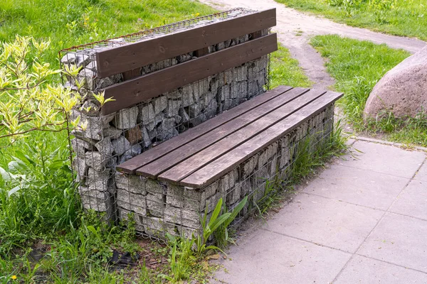Gabion Stone Bench in Park, Outdoor City Architecture, Wooden Benches, Outdoor Chair, Urban Public Furniture, Empty Plank Seat, Comfortable Bench in Recreation Area