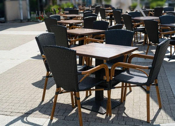 stock image Street Restaurant Table, Empty Cafe Tables, Bistro Seat, Bar Terrace, Outdoor Restaurants, Cafeteria, Outside Trattoria, City Coffee Shops Furniture, Summer Street Table