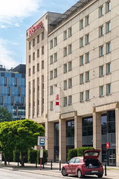 Stock image Warsaw, Poland, May 22, 2024: Ibis Warsaw hotel, red pillow logo, Accor group hotels exterior, Ibis Warszawa Stare Miasto, editorial image