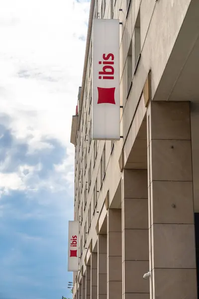 stock image Warsaw, Poland, May 22, 2024: Ibis Warsaw hotel, red pillow logo, Accor group hotels exterior, Ibis Warszawa Stare Miasto, editorial image