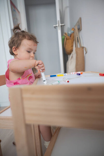 Toddlers Creative Moment at Montessori Desk
