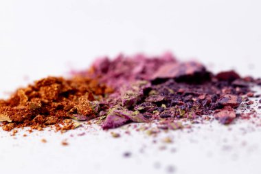 An exquisite close-up view of assorted natural color powders, showcasing a vibrant mixture of hues including rich reds, purples, and earthy tones ideal for art, design, and cosmetics. clipart