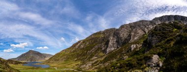 Breathtaking Panoramic View of Lake Llyn Idwal from up the Glyderau Mountain Range in the Legendary Ice-Carved Cwm Idwal of North Eryri (Snowdonia) clipart